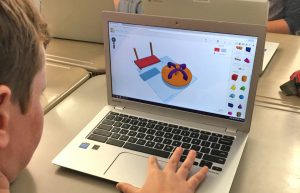 Student engaged in Tinkercad design